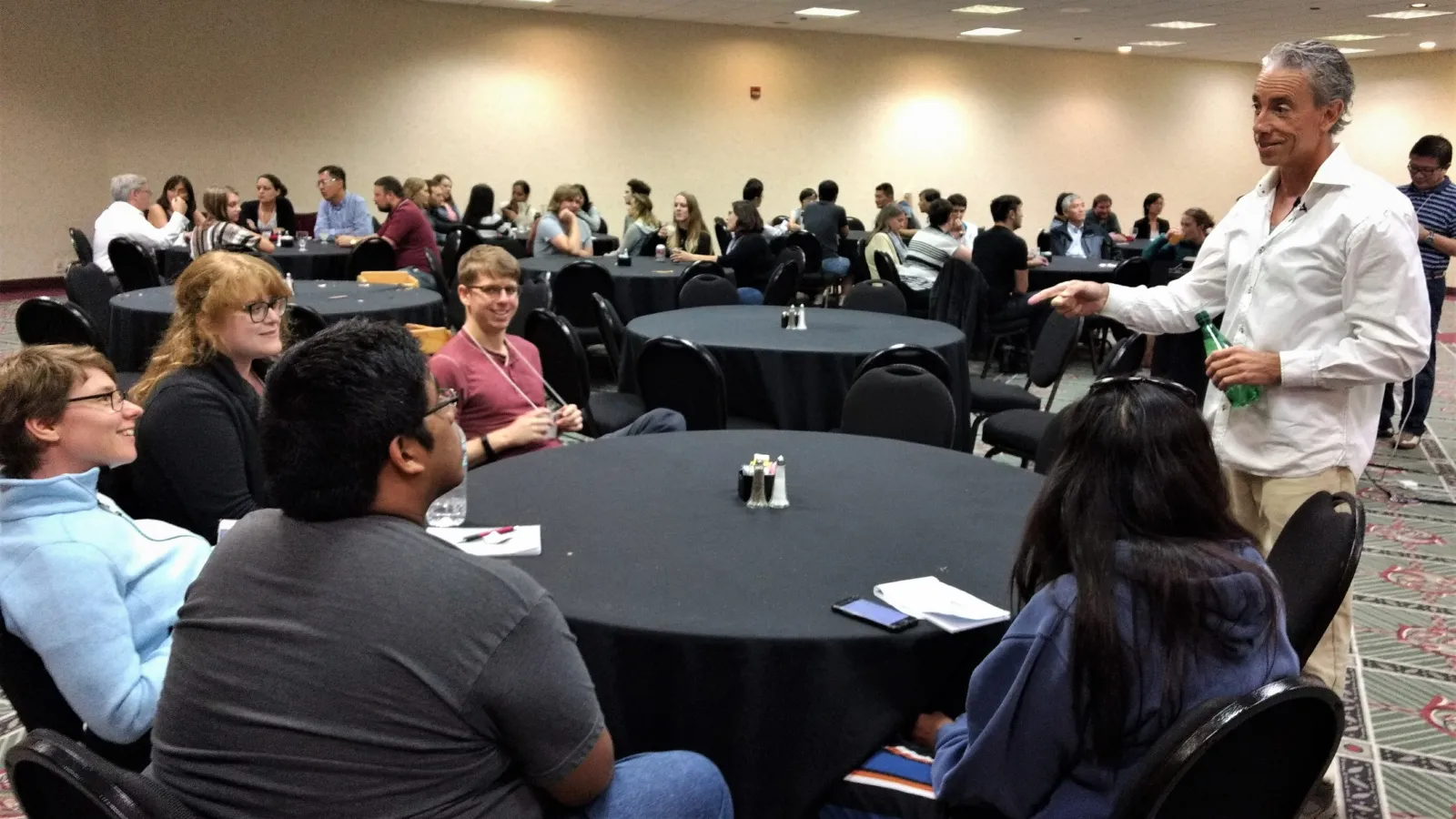 Dr. Frederick Aldama speaks with participants