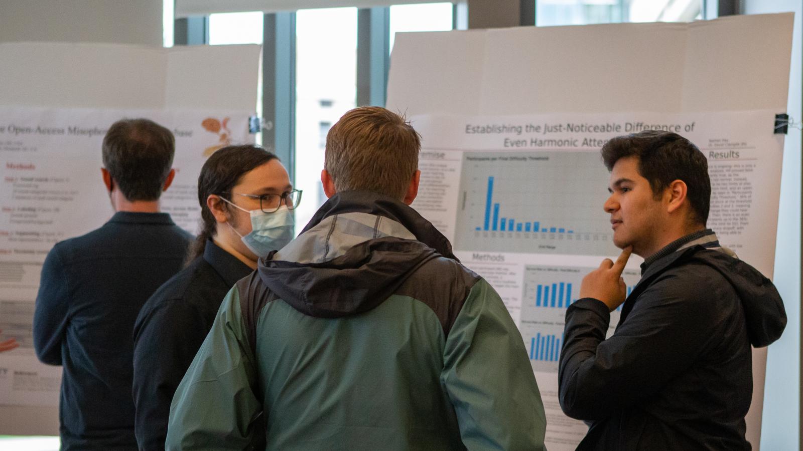 Image of presenters at the 2023 poster session
